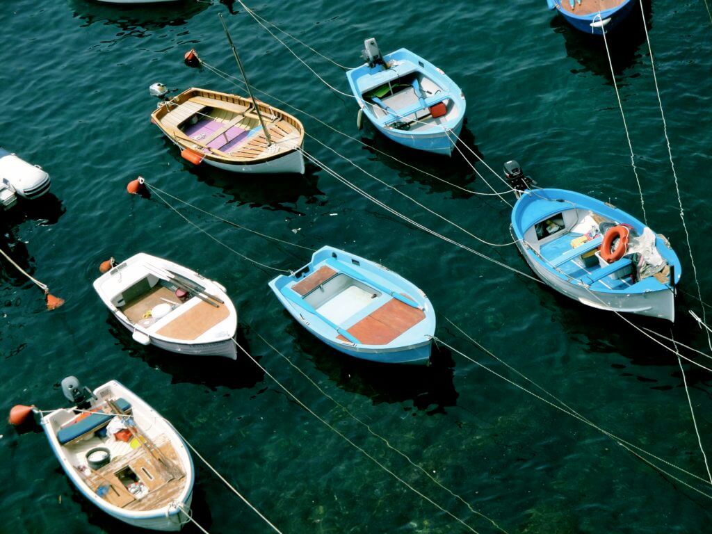 Boats in Cinque Terre. Discover 15 picture perfect reasons to visit Italy. And for more travel tips and wanderlust inspiration follow The Scenic Suitcase on Pinterest!
