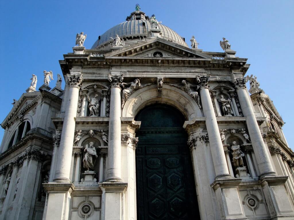 Basilica Santa Maria della Salute in Venice. Discover 15 picture perfect reasons to visit Italy. And for more travel tips and wanderlust inspiration follow The Scenic Suitcase on Pinterest!