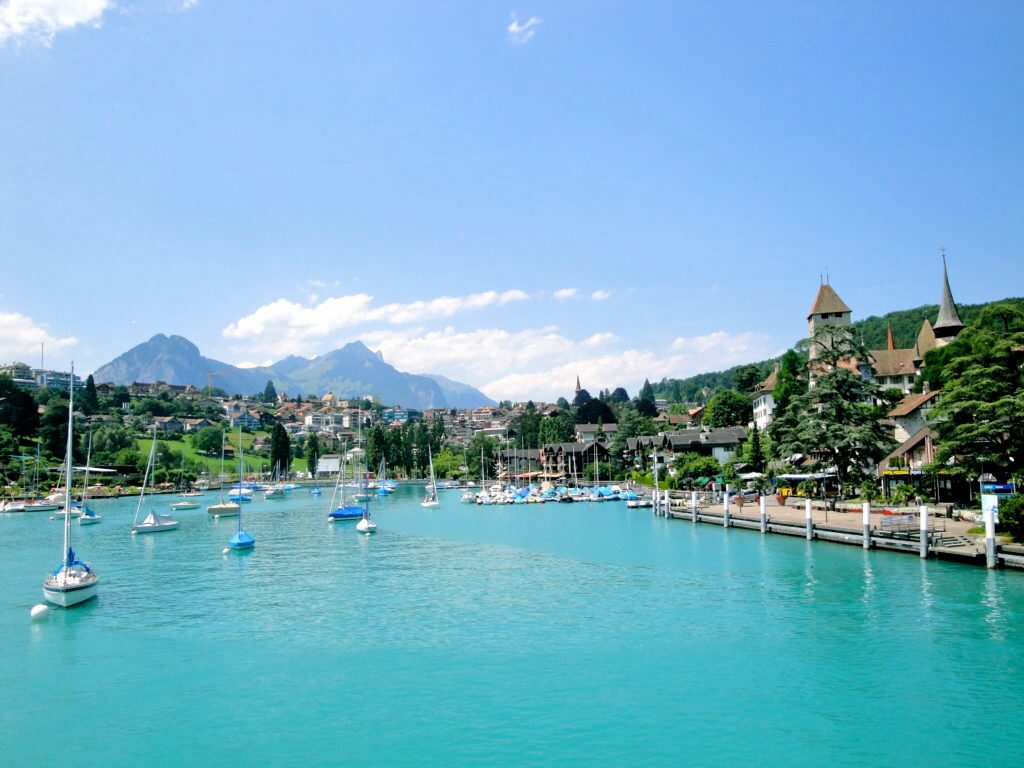 Lake Thun. A visit to Switzerland will have you feeling you just walked into The Sound of Music. Here are some sights and landmarks you absolutely shouldn't miss. And for more travel tips and wanderlust inspiration follow The Scenic Suitcase on Pinterest!