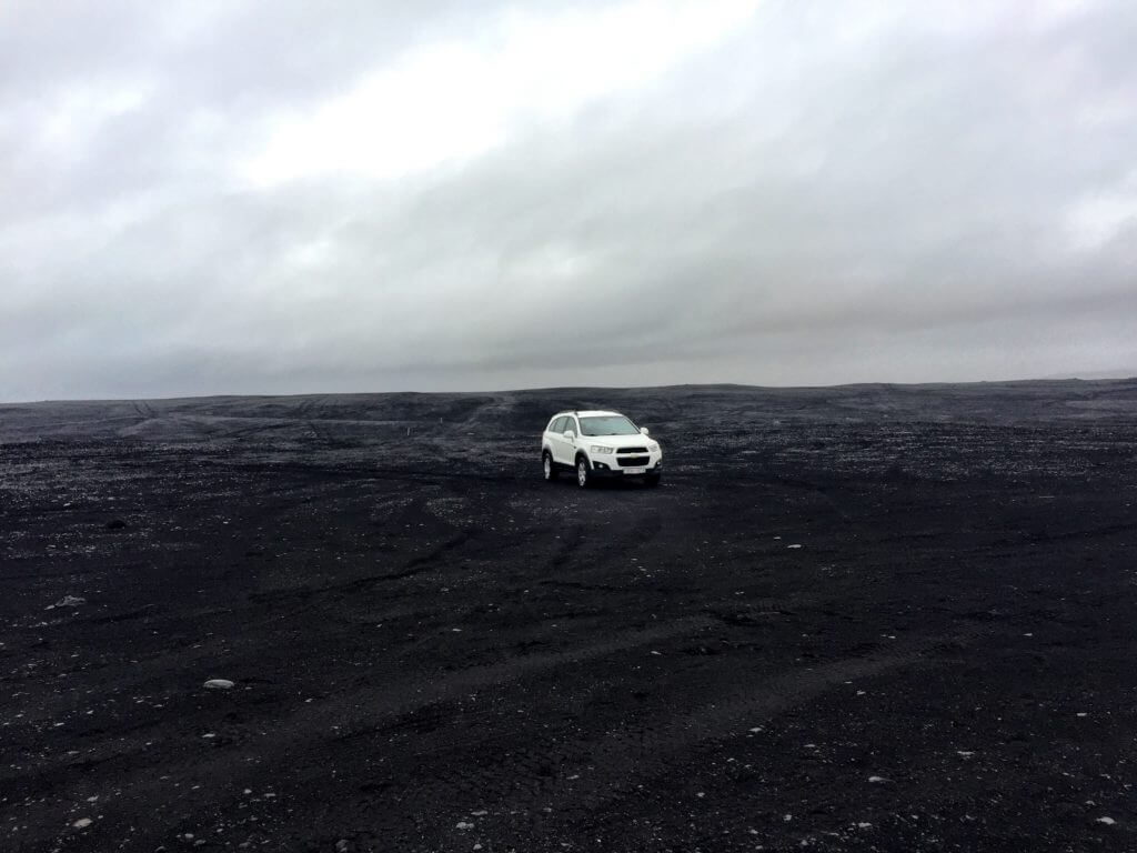 Driving on a black sand beach. Discover picture perfect reasons to visit Iceland. Find out why it's become such a popular travel destination, and what you shouldn't miss when you're there! And for more travel tips and wanderlust inspiration follow The Scenic Suitcase on Pinterest!