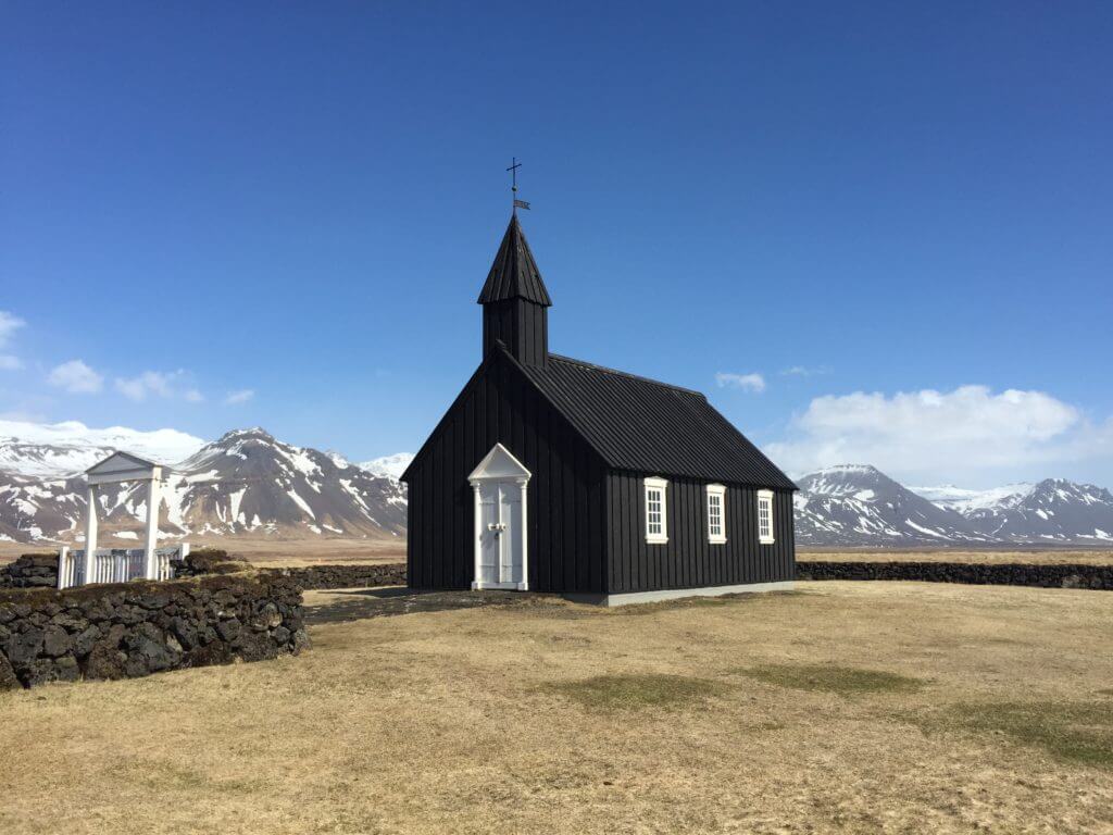 Budir Black Church. Discover picture perfect reasons to visit Iceland. Find out why it's become such a popular travel destination, and what you shouldn't miss when you're there! And for more travel tips and wanderlust inspiration follow The Scenic Suitcase on Pinterest!