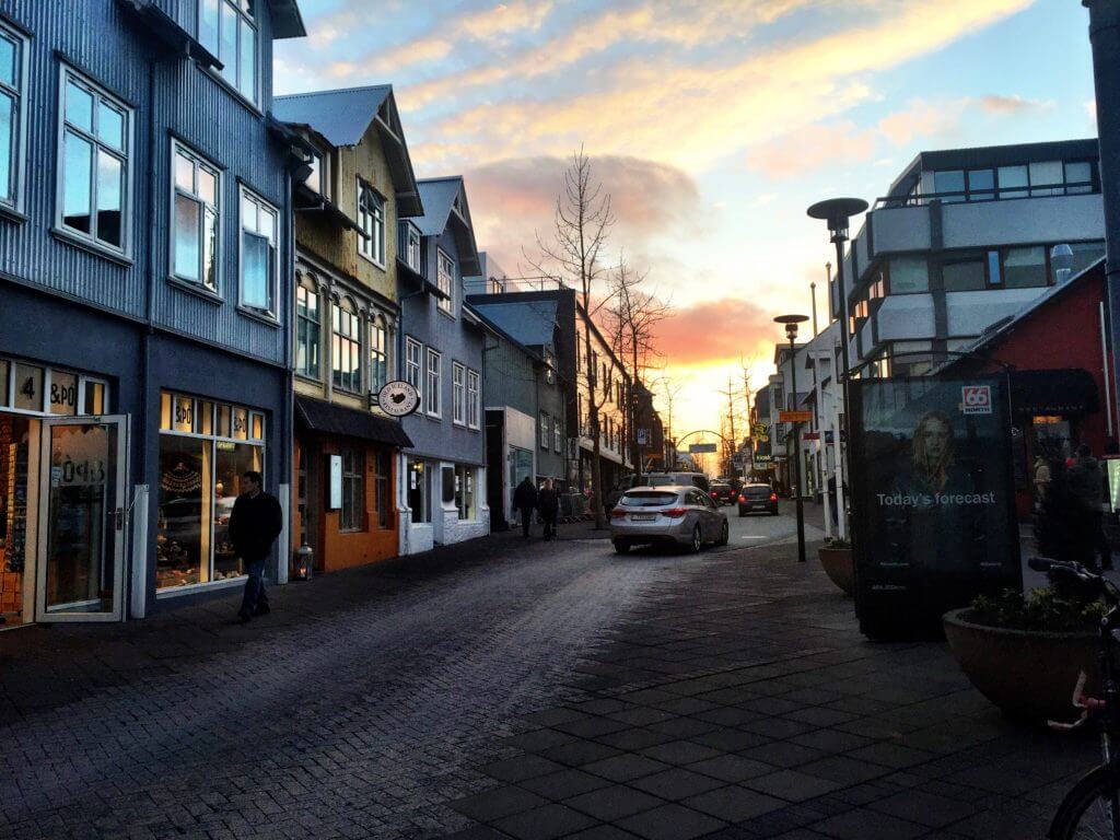 Sunset in downtown Reykjavik. Discover picture perfect reasons to visit Iceland. Find out why it's become such a popular travel destination, and what you shouldn't miss when you're there! And for more travel tips and wanderlust inspiration follow The Scenic Suitcase on Pinterest!
