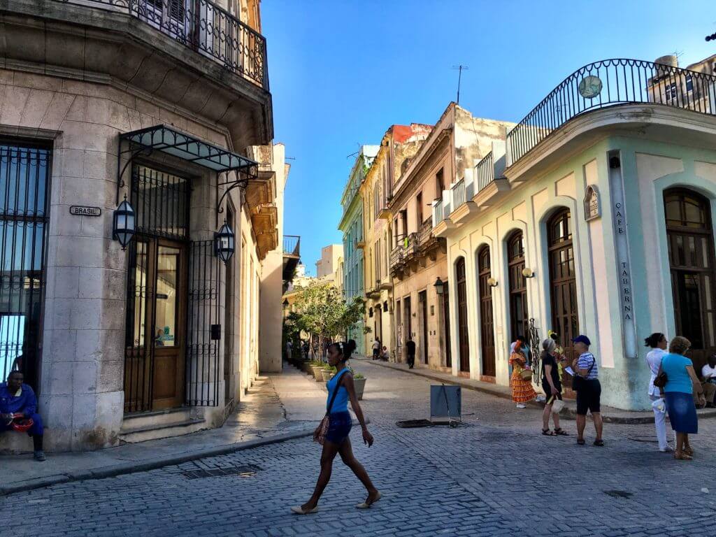 Strolling the cobblestone streets of Havana. Discover picture perfect reasons to visit Cuba. Find out why it's become such a popular travel destination, and what you shouldn't miss when you're there! And for more travel tips and wanderlust inspiration follow The Scenic Suitcase on Pinterest!