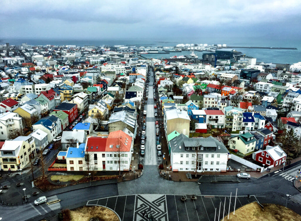 A view of downtown Reykjavik from the top of the Hallgrimskirkja belltower. Discover picture perfect reasons to visit Iceland. Find out why it's become such a popular travel destination, and what you shouldn't miss when you're there! And for more travel tips and wanderlust inspiration follow The Scenic Suitcase on Pinterest!