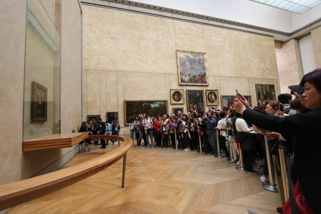 The Mona Lisa in the Louvre. Discover 25 picture perfect reasons to visit Paris, France. Looking for even more wanderlust inspiration? Then follow The Scenic Suitcase on Pinterest!