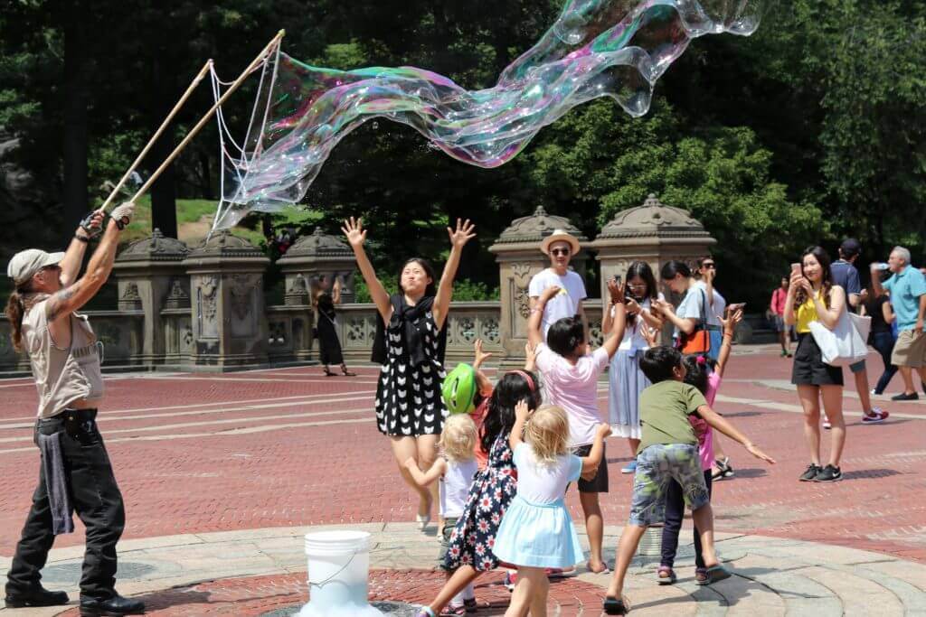 Giant bubbles in Central Park. Discover 30 picture perfect reasons to visit New York City. And for more travel tips and wanderlust inspiration follow The Scenic Suitcase on Pinterest!