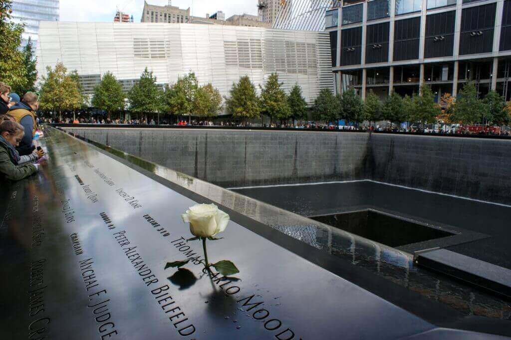 The 9/11 Memorial fountains with a rose. Discover 30 picture perfect reasons to visit New York City. And for more travel tips and wanderlust inspiration follow The Scenic Suitcase on Pinterest!