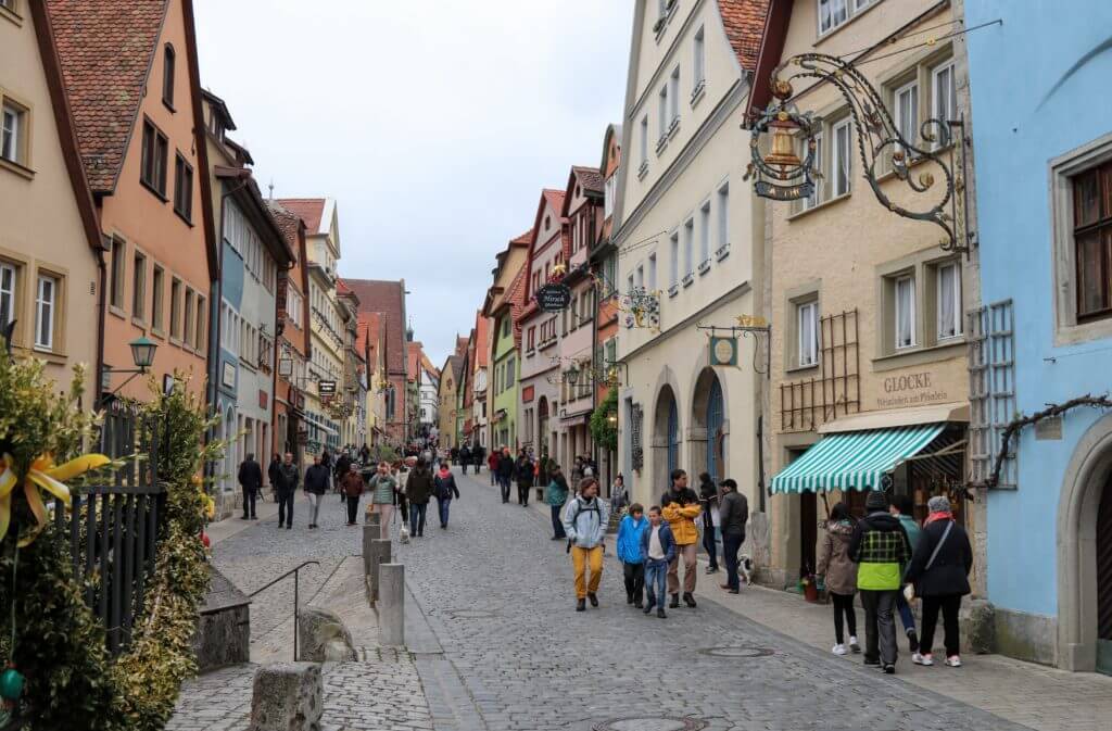 The cobblestone streets near Plonlein in Rothenburg ob der Tauber. Discover 20 picture perfect reasons to visit Germany. Want even more wanderlust inspiration? Follow The Scenic Suitcase on Pinterest!