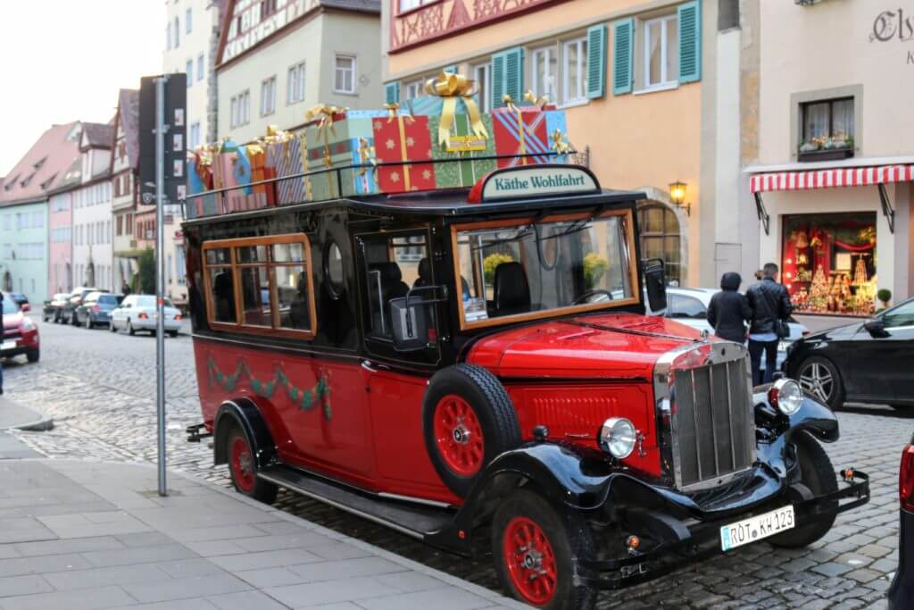 An old fashion Christmas station wagon in Rothenburg ob der Tauber. Discover 20 picture perfect reasons to visit Germany. Want even more wanderlust inspiration? Follow The Scenic Suitcase on Pinterest!