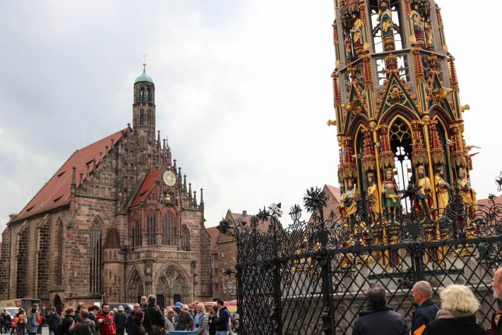 The Schoner Brunnen fountain and the Frauenkirche Nurnberg in Nuremberg. Discover 20 picture perfect reasons to visit Germany. Want even more wanderlust inspiration? Follow The Scenic Suitcase on Pinterest!
