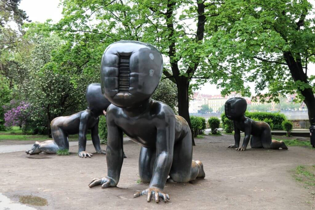 Crawling baby statues in the park. Discover 25 picture perfect reasons to visit Prague, Czech Republic. Want even more wanderlust inspiration? Follow The Scenic Suitcase on Pinterest!