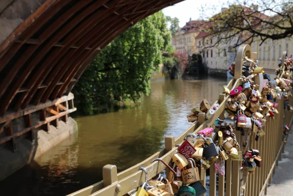 Love locks along a bridge in Prague. Discover 25 picture perfect reasons to visit Prague, Czech Republic. Want even more wanderlust inspiration? Follow The Scenic Suitcase on Pinterest!