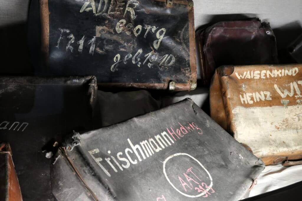 Suitcases left behind by Holocaust victims. The two most famous concentration camps in WWII - Auschwitz I & Auschwitz-Birkenau. Please note, this post contains graphic material. Discretion is advised. And for more travel tips and wanderlust inspiration follow The Scenic Suitcase on Pinterest!