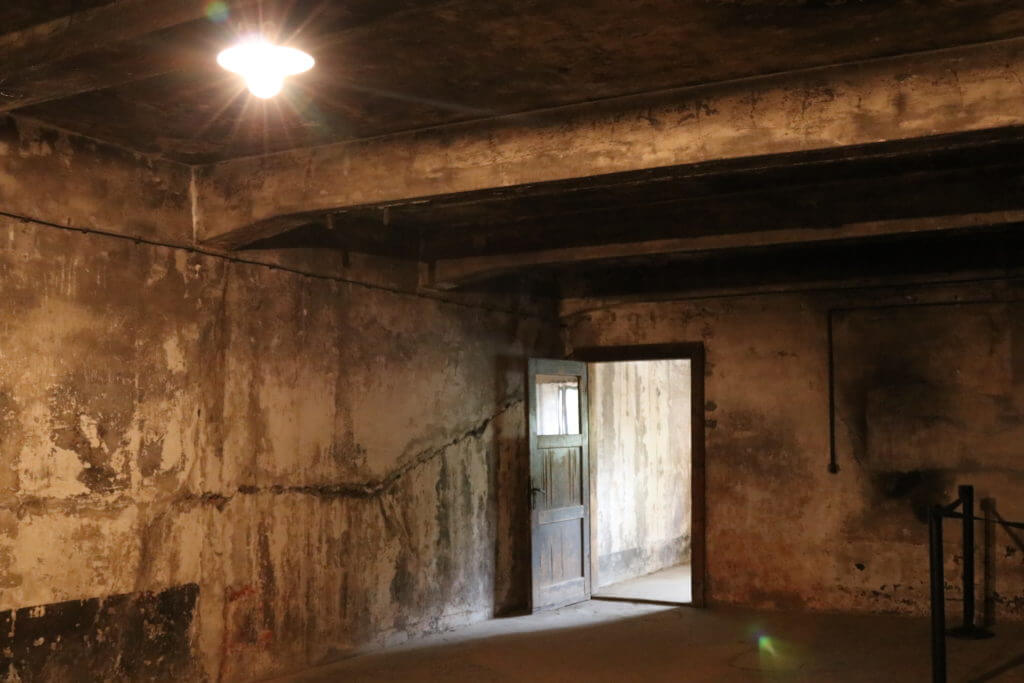 A gas chamber in Auschwitz. The two most famous concentration camps in WWII - Auschwitz I & Auschwitz-Birkenau. Please note, this post contains graphic material. Discretion is advised. And for more travel tips and wanderlust inspiration follow The Scenic Suitcase on Pinterest!