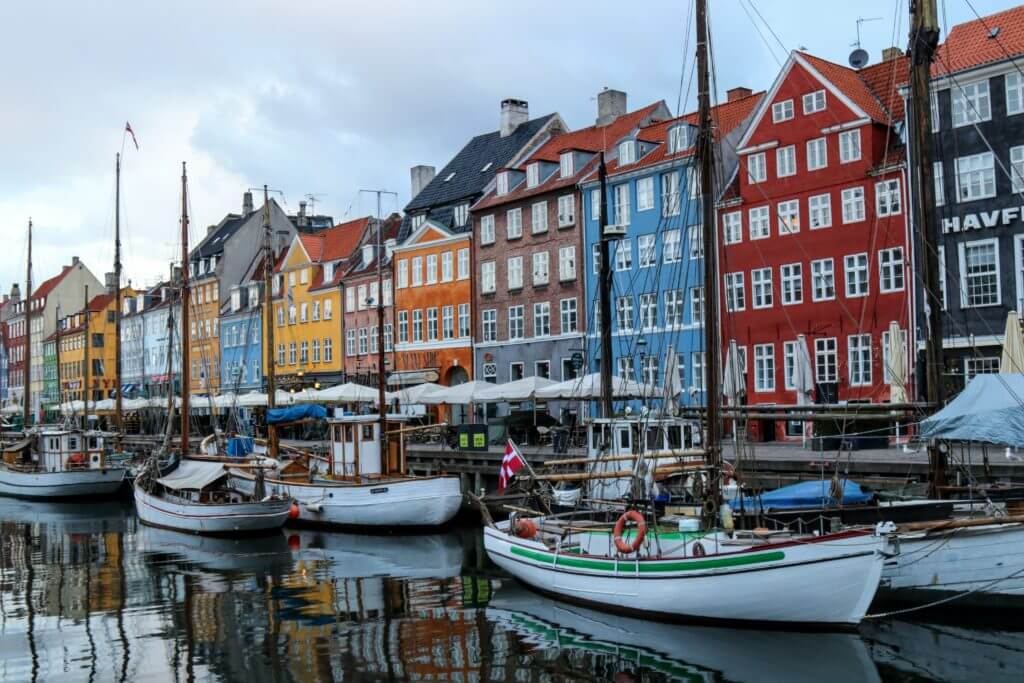 Boats and colorful storefronts along the Nyhavn Canal. Discover 12 picture perfect reasons to visit Copenhagen, Denmark. Want even more wanderlust inspiration? Follow The Scenic Suitcase on Pinterest!