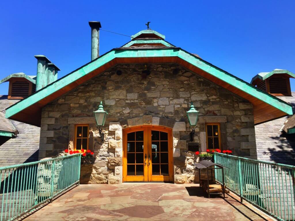 Far Niente winery entrance. Discover 15 picture perfect reasons to visit Napa, California - one of the most famous wine regions in the world. And for more travel tips and wanderlust inspiration follow The Scenic Suitcase on Pinterest!