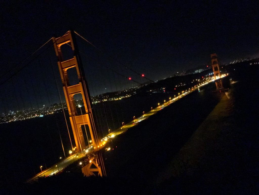 The Golden Gate Bridge at night. San Francisco is a gem among California's coastal cities. Discover 15 picture perfect reasons why you should plan a trip to the City by the Bay. For more travel tips and wanderlust inspiration follow The Scenic Suitcase on Pinterest!