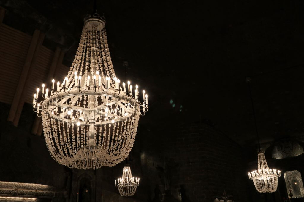 Chandeliers made of salt. The Wieliczka Salt Mine in Poland is a marvel 12 million years in the making. Discover what makes this salty wonderland worthy of a UNESCO designation. For more travel tips and wanderlust inspiration follow The Scenic Suitcase on Pinterest!