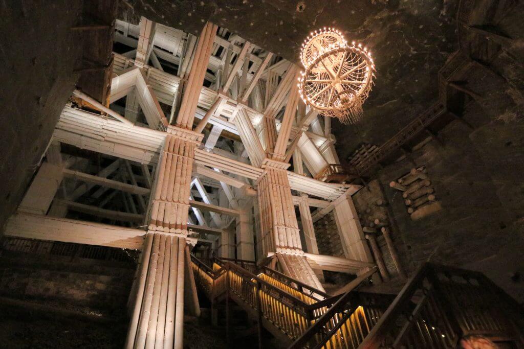The Wieliczka Salt Mine in Poland is a marvel 12 million years in the making. Discover what makes this salty wonderland worthy of a UNESCO designation. For more travel tips and wanderlust inspiration follow The Scenic Suitcase on Pinterest!