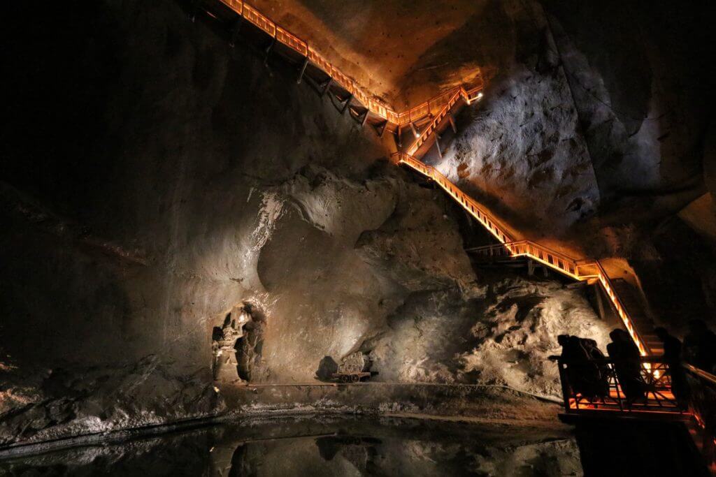 The Wieliczka Salt Mine in Poland is a marvel 12 million years in the making. Discover what makes this salty wonderland worthy of a UNESCO designation. For more travel tips and wanderlust inspiration follow The Scenic Suitcase on Pinterest!