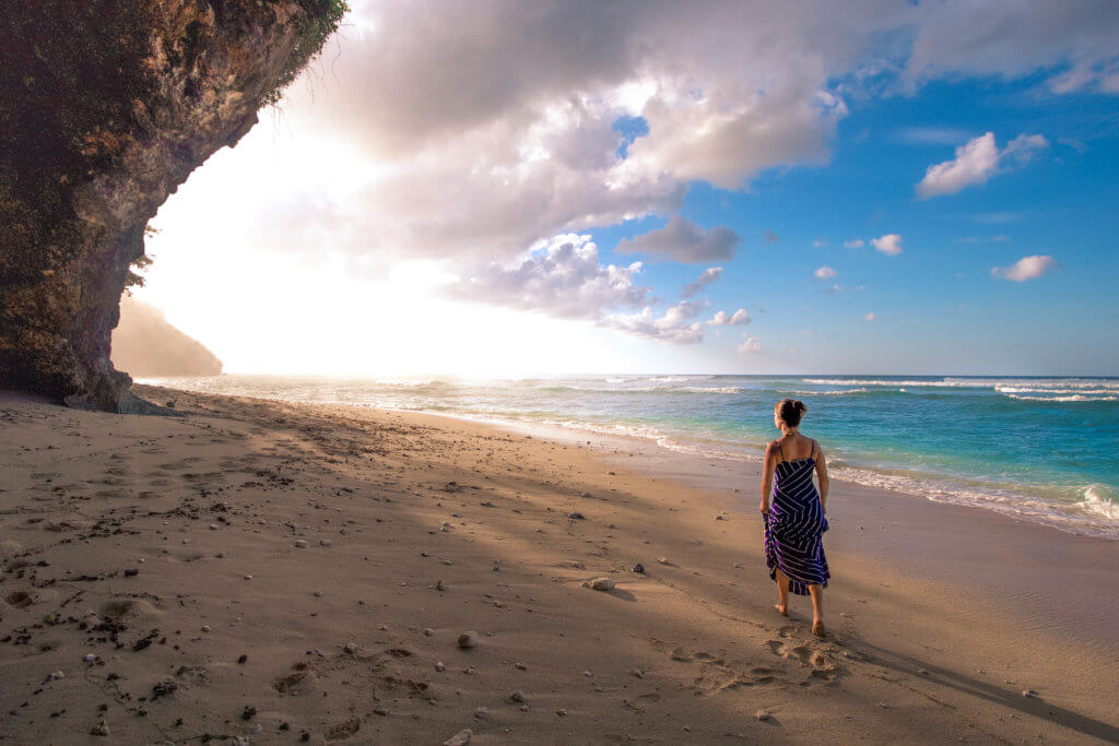 Walking on the beach at sunrise. Discover 27 picture perfect things to see in Bali, Indonesia. And for more travel tips and wanderlust inspiration, follow The Scenic Suitcase on Pinterest!