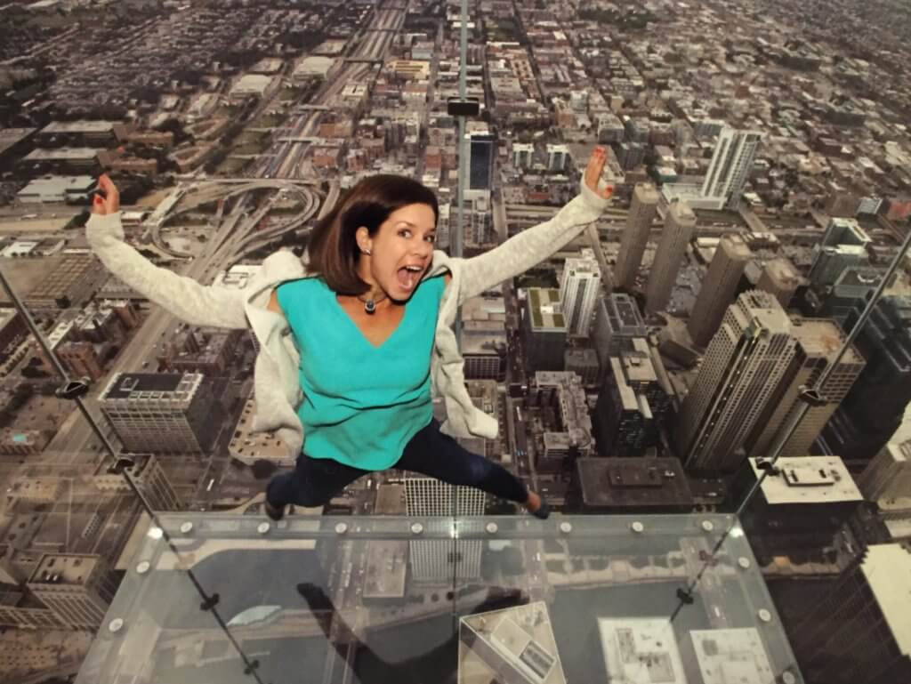 Falling from The Ledge in the former Sears Tower. Discover 12 picture perfect reasons to visit Chicago, Illinois. For more travel tips and wanderlust inspiration follow The Scenic Suitcase on Pinterest!