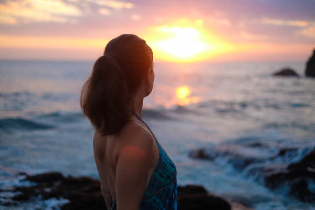 Watching the sunset over the ocean. Discover 27 picture perfect things to see in Bali, Indonesia. And for more travel tips and wanderlust inspiration, follow The Scenic Suitcase on Pinterest!