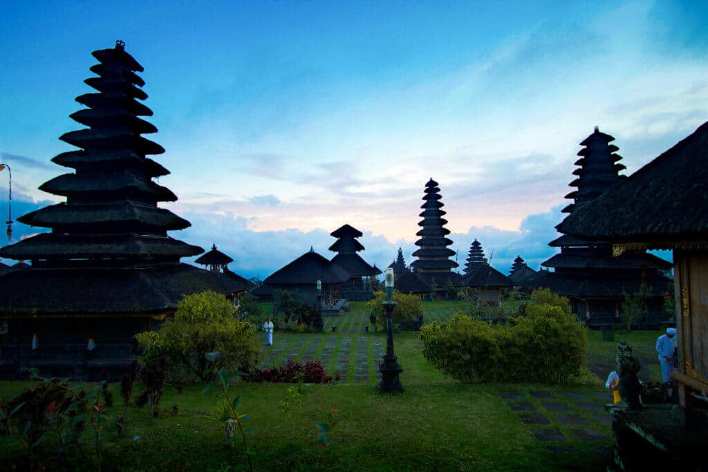 Walking in the clouds at sunset in the Besakih Temple. Discover 27 picture perfect things to see in Bali, Indonesia. And for more travel tips and wanderlust inspiration, follow The Scenic Suitcase on Pinterest!