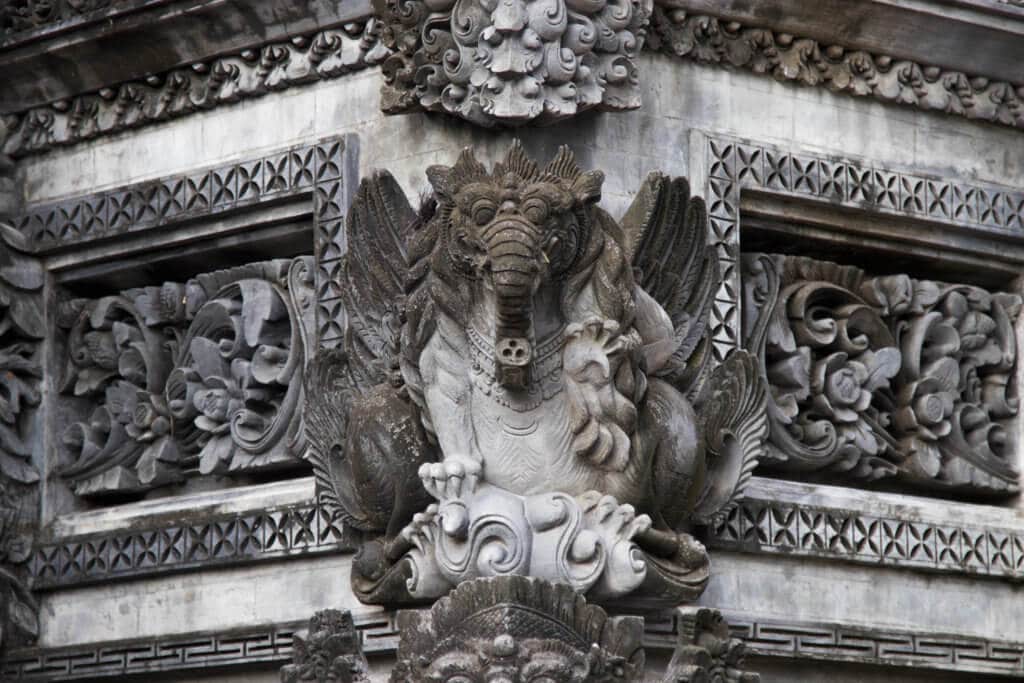 A dragon carved in stone outside a temple. Discover 27 picture perfect things to see in Bali, Indonesia. And for more travel tips and wanderlust inspiration, follow The Scenic Suitcase on Pinterest!