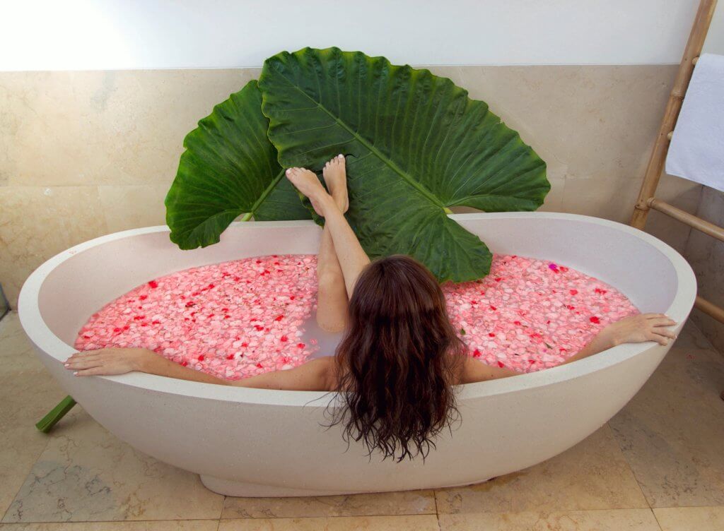 Relaxing with a flower petal bath. Find out what it's like to attend The Blonde Abroad blogging retreat in Bali. From detailed coursework, to a beautiful villa, to delicious food and more!