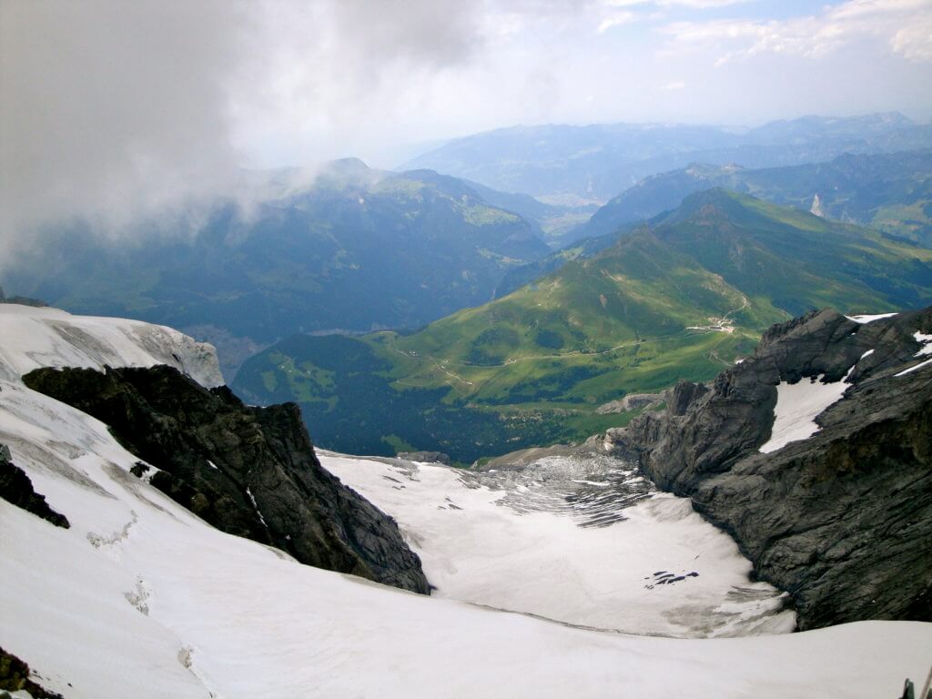 The view from Jungfraujoch - Top of Europe in the Swiss Alps. Discover 5 of Europe's most charming villages! And for more travel tips and wanderlust inspiration, follow The Scenic Suitcase on Pinterest!