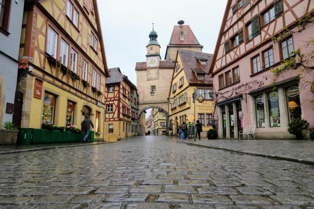 Cobblestone streets near the Romantik Hotel Markusturm in Rothenberg ob der Tauber. Discover 5 of Europe's most charming villages! And for more travel tips and wanderlust inspiration, follow The Scenic Suitcase on Pinterest!
