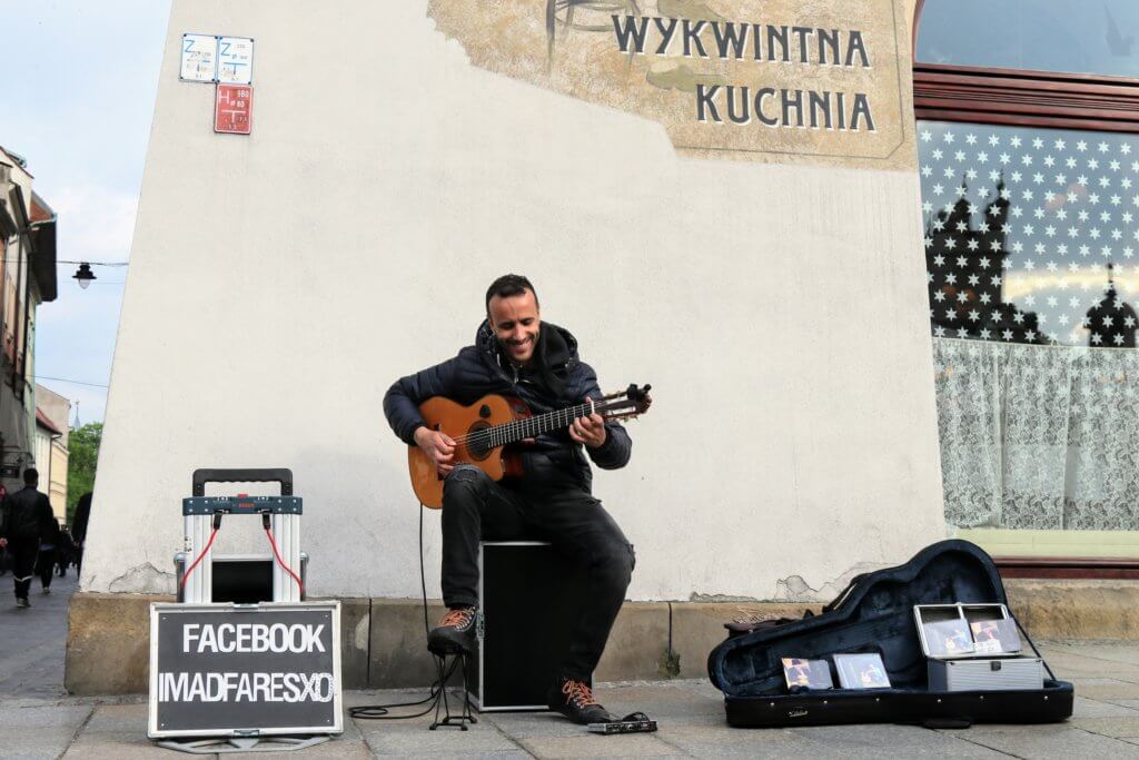 An incredibly talented street performer in the main market square. Just one of the many reasons to visit Krakow, Poland. For more travel tips and wanderlust inspiration follow The Scenic Suitcase on Pinterest!