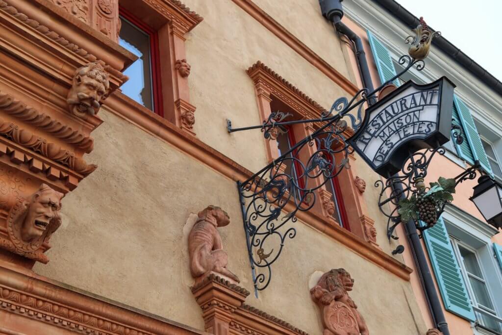 House of Heads in Colmar, France. Discover 5 of Europe's most charming villages! And for more travel tips and wanderlust inspiration, follow The Scenic Suitcase on Pinterest!