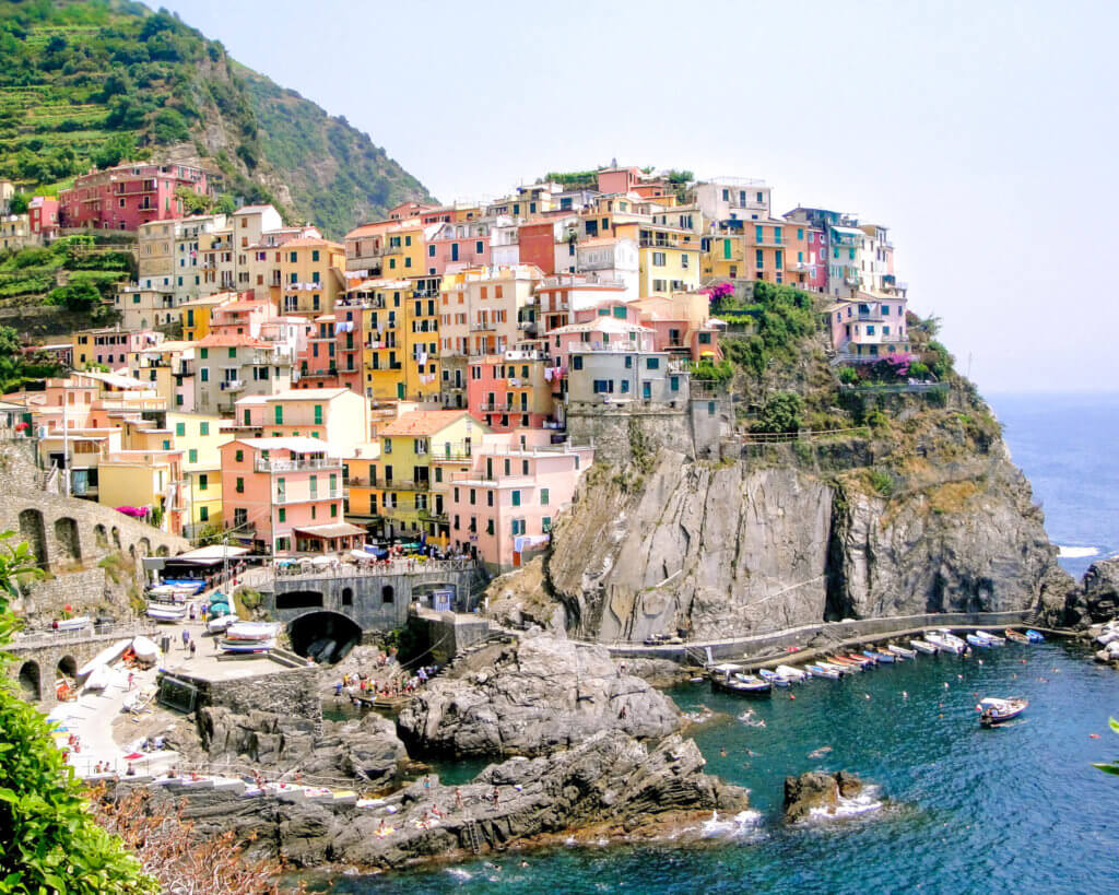 The cliffside village of Manarola in Cinque Terre, Italy. Discover 5 of Europe's most charming villages! And for more travel tips and wanderlust inspiration, follow The Scenic Suitcase on Pinterest!