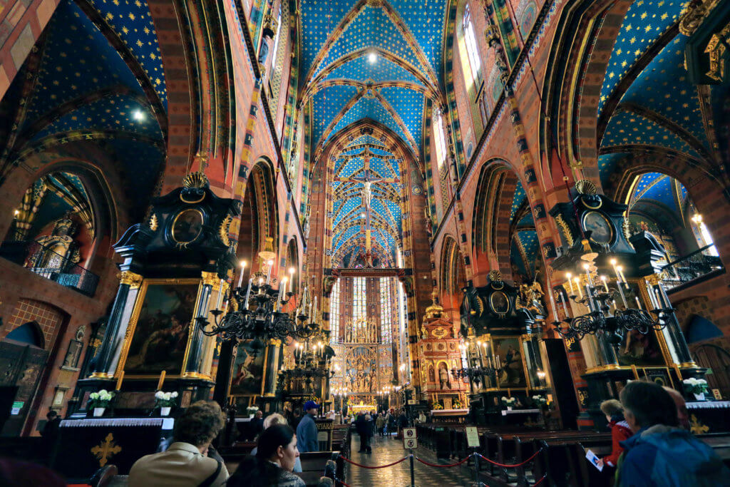 The striking blue interior of St. Mary's Basilica. Just one of the many reasons to visit Krakow, Poland. For more travel tips and wanderlust inspiration follow The Scenic Suitcase on Pinterest!