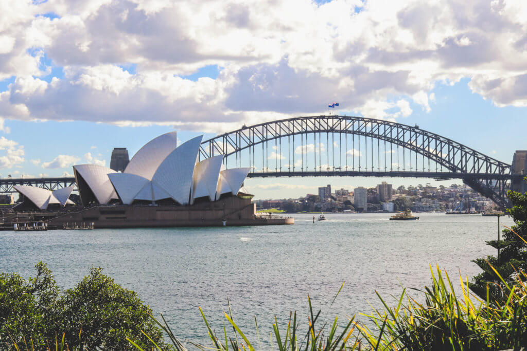 A beautiful view of the Sydney Harbour Bridge and the Sydney Opera House from the Royal Botanic Gardens. Discover the most picture perfect moments of the year. And for more travel tips and wanderlust inspiration, follow The Scenic Suitcase on Pinterest!