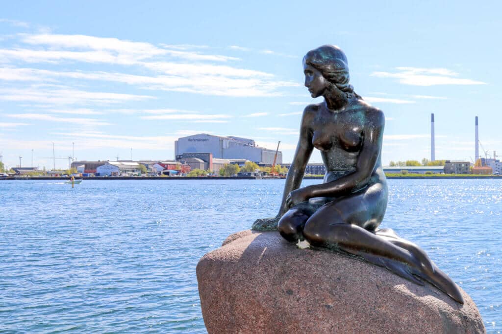 The Little Mermaid statue in Copenhagen, Denmark. Discover the most picture perfect moments of the year. And for more travel tips and wanderlust inspiration, follow The Scenic Suitcase on Pinterest!