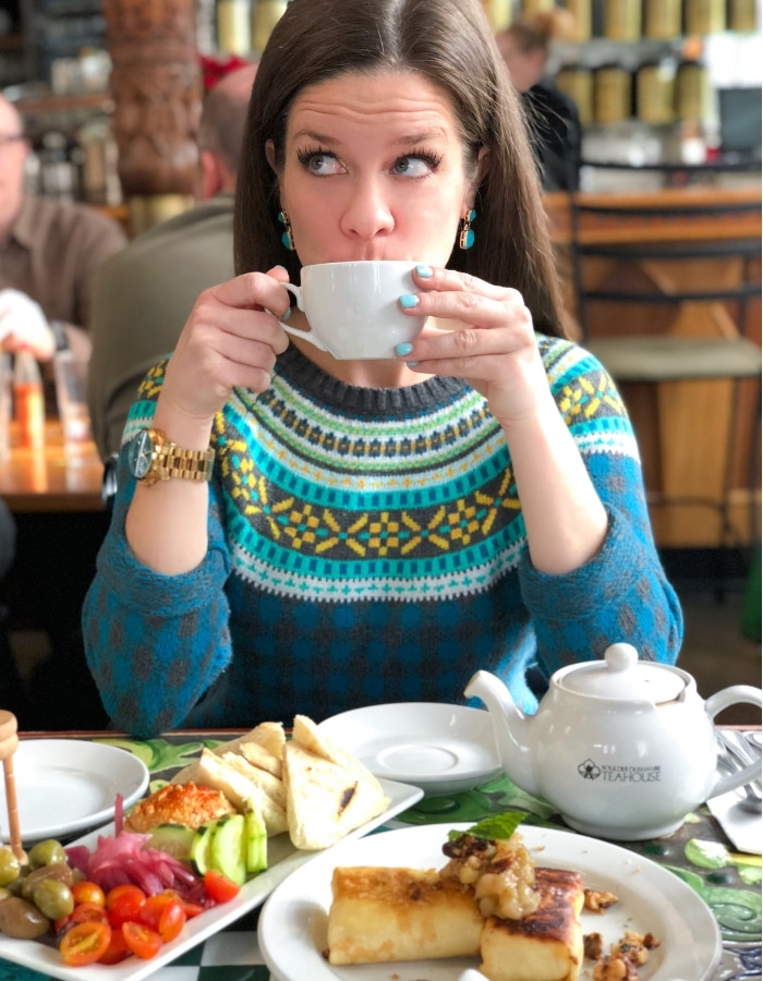 Drinking tea at the Boulder Dushanbe Teahouse with tasty appetizers. Discover 20 picture perfect reasons to visit Colorado in winter. And for more travel tips and wanderlust inspiration follow The Scenic Suitcase on Pinterest!