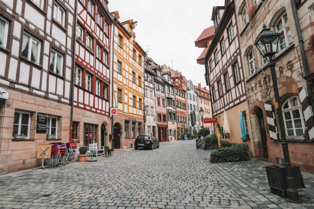 The cobblestone streets and half-timbered houses of Nuremberg, Germany. Discover the most picture perfect moments of the year. And for more travel tips and wanderlust inspiration, follow The Scenic Suitcase on Pinterest!