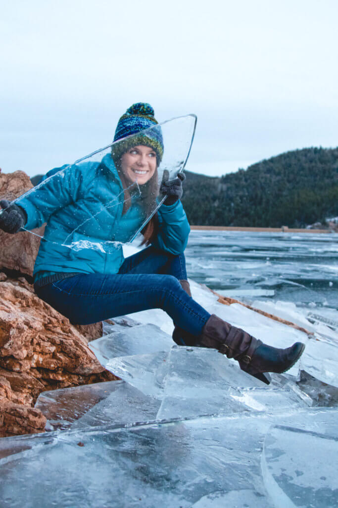 Looking through a large piece of lake ice. Discover 20 picture perfect reasons to visit Colorado in winter. And for more travel tips and wanderlust inspiration follow The Scenic Suitcase on Pinterest!