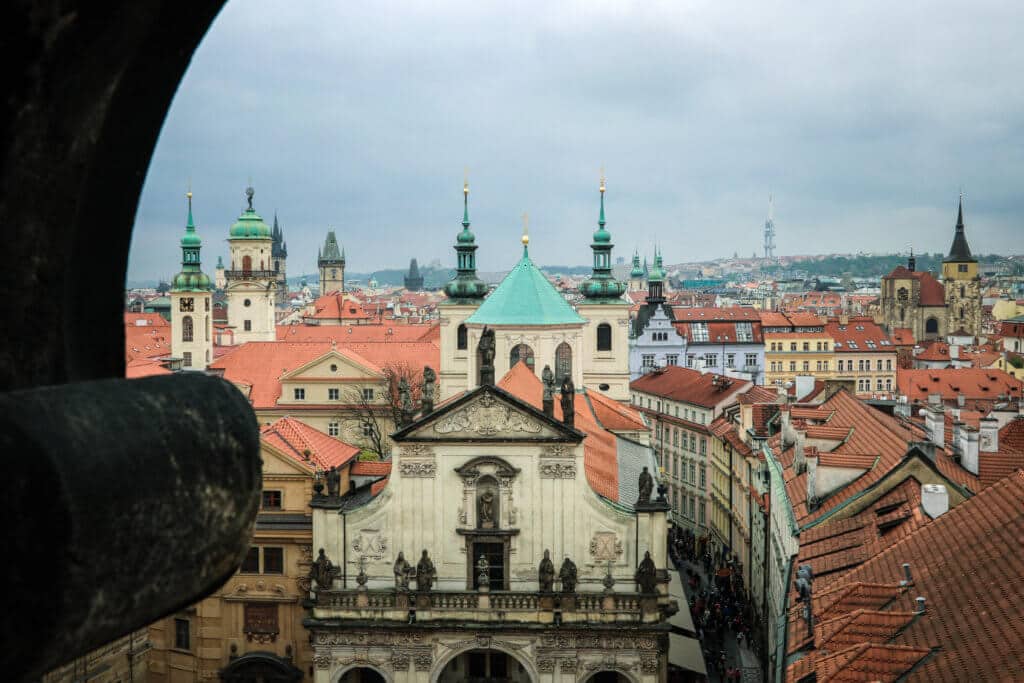 Prague's many spired rooftops from the top of the St. Charles Bridge. Discover 25 picture perfect reasons to visit Prague, Czech Republic. Want even more wanderlust inspiration? Follow The Scenic Suitcase on Pinterest!