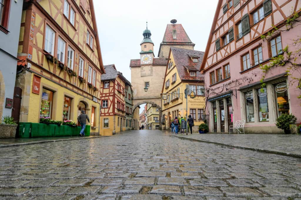 The cobblestone streets and colorful half-timbered buildings of Rothenberg ob der Tauber, Germany. Discover the most picture perfect moments of the year. And for more travel tips and wanderlust inspiration, follow The Scenic Suitcase on Pinterest!