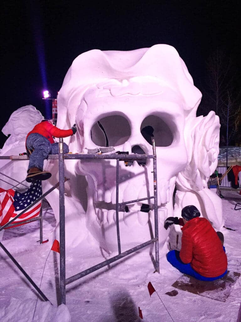 Americans working on a Day of the Dead snow sculpture at the International Snow Sculpture Festival in Breckenridge. Discover 20 picture perfect reasons to visit Colorado in winter. And for more travel tips and wanderlust inspiration follow The Scenic Suitcase on Pinterest!