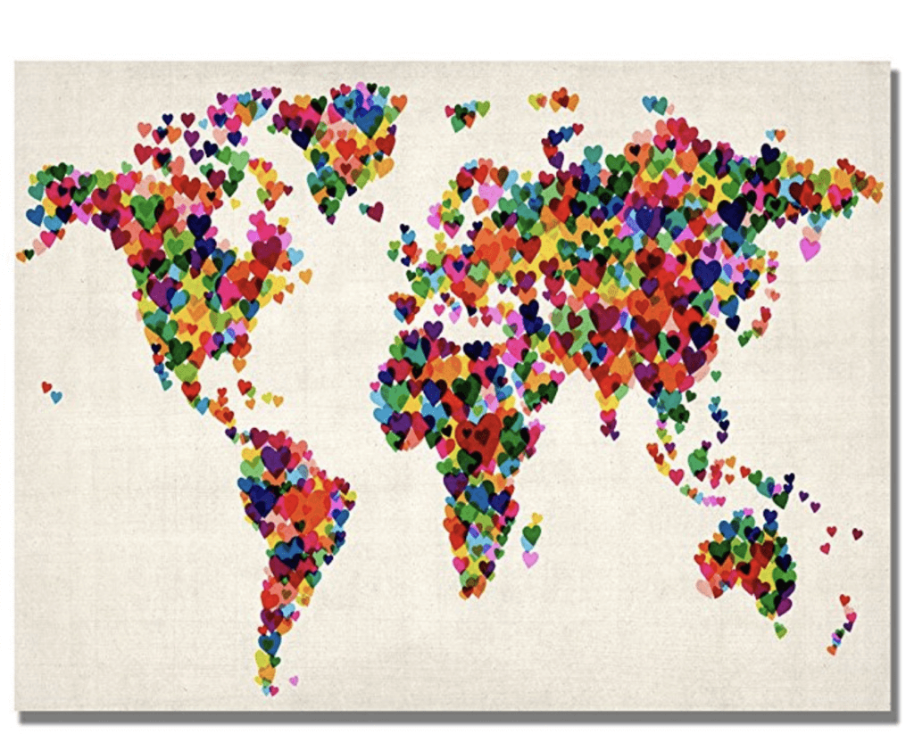 A world map made of multi-colored hearts on canvas. Looking for a heartfelt gift for the traveller in your life? Then discover 12 wanderfully romantic travel gifts for your special someone! And for more wanderlust inspiration and travel tips follow The Scenic Suitcase on Pinterest!