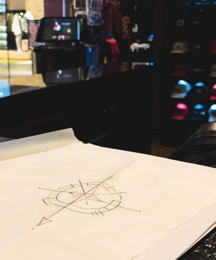 A drawing of a compass at the Hart & Huntington Tattoo Co. Find out what it's like to get a tattoo at Hart & Huntington Las Vegas. A behind the scenes look at the shop featured in A&E's hit television series "Inked". And for more travel tips and wanderlust inspiration follow The Scenic Suitcase on Pinterest!