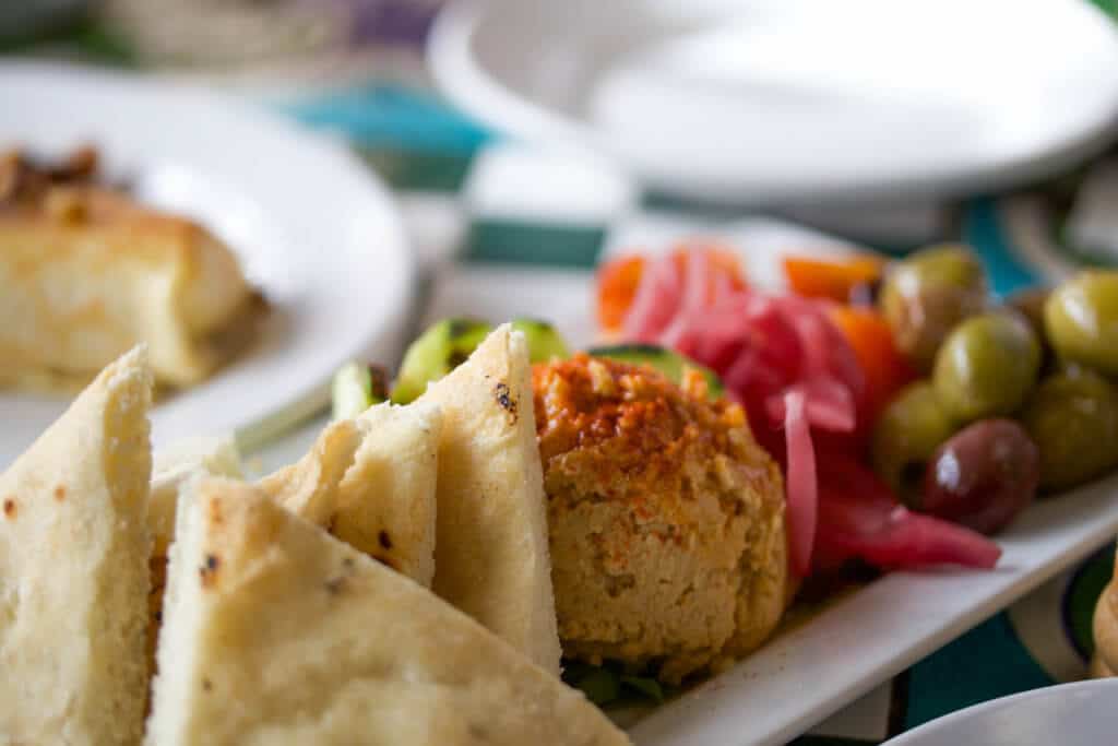 A delicious hummus plate. Discover the fascinating history and stunning beauty of the Boulder Dushanbe Teahouse. Learn why it's one place in Colorado you simply can't miss! And for more travel tips and wanderlust inpiration follow The Scenic Suitcase on Pinterest!