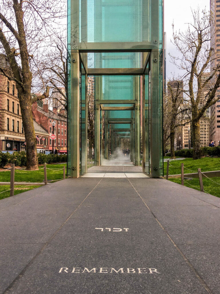 A sidewalk leading through the glass towers of the Holocaust Memorial. Discover the picture perfect reasons to visit Boston, Massachusetts. From historic landmarks to local favorites, this is what you shouldn't miss on your trip to Beantown. And for more wanderlust inspiration and travel tips follow The Scenic Suitcase on Pinterest!