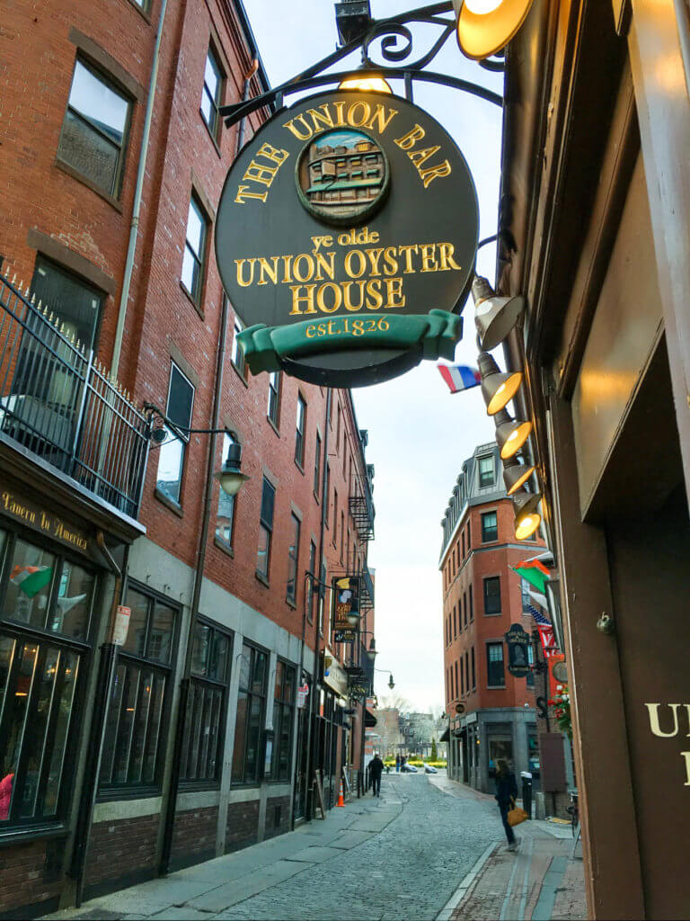 A sign for the Union Oyster House looking up the street. Discover the picture perfect reasons to visit Boston, Massachusetts. From historic landmarks to local favorites, this is what you shouldn't miss on your trip to Beantown. And for more wanderlust inspiration and travel tips follow The Scenic Suitcase on Pinterest!
