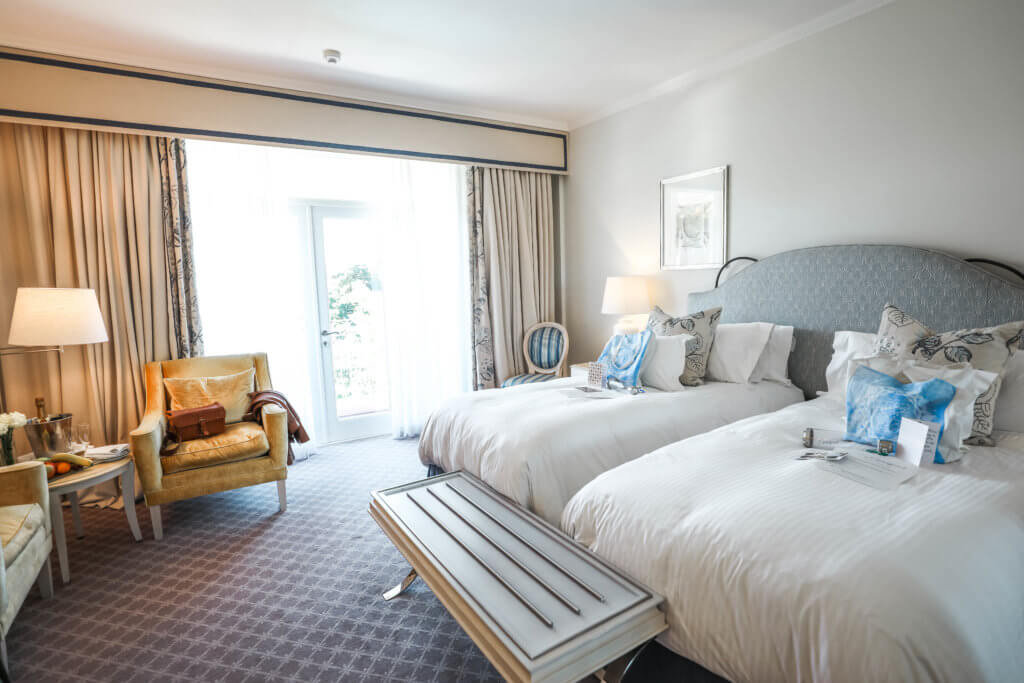 A bright bedroom at the Belmont Hotel in Cape Town. Find out why attending The Blonde Abroad photography tour is a once-in-a-lifetime experience you shouldn't miss. And for more travel tips and wanderlust inspiration, follow The Scenic Suitcase on Pinterest!